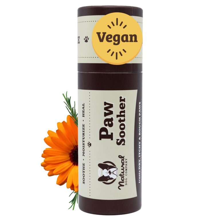 Dog paw soother tube with vegan label, flower, and rosemary sprig