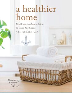 Book cover with a bathroom scene and a basket of white towels