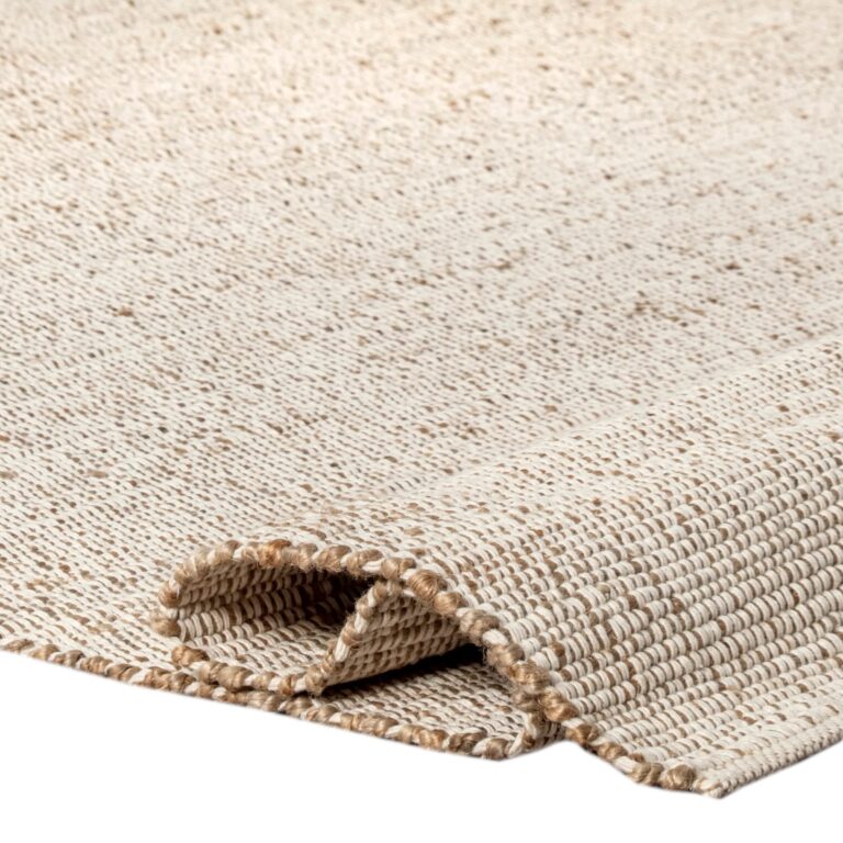 Beige woven rug with rolled edge, close-up view on white background