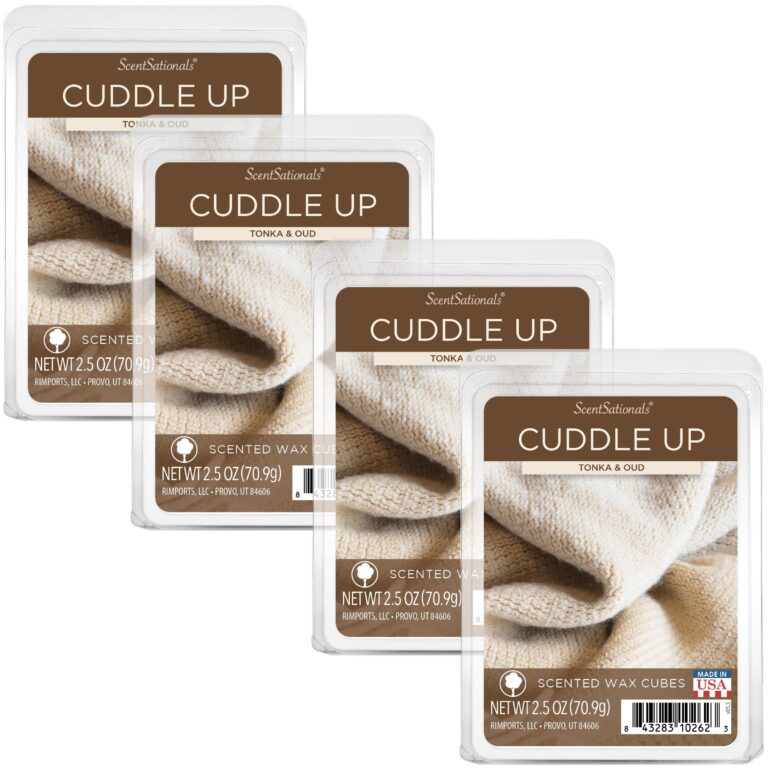 Four "Cuddle Up" scented wax melt packages with a textured fabric background