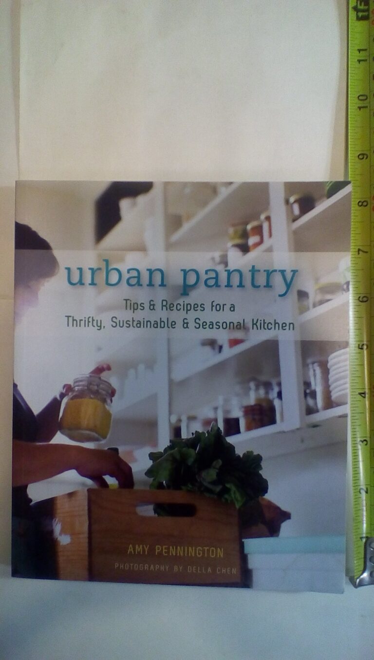 Urban Pantry" cookbook cover with person holding jar, wooden crate, and greens
